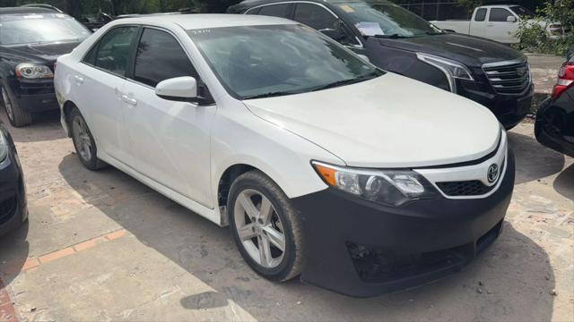 used 2014 Toyota Camry car, priced at $2,850