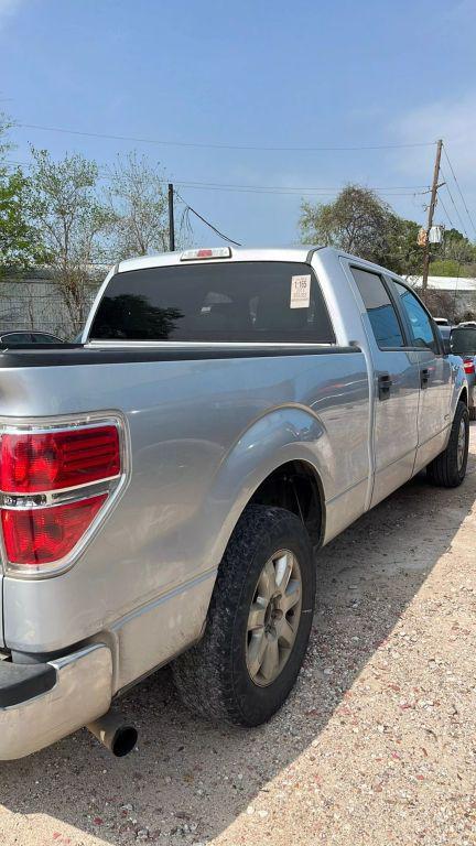 used 2013 Ford F-150 car, priced at $6,400