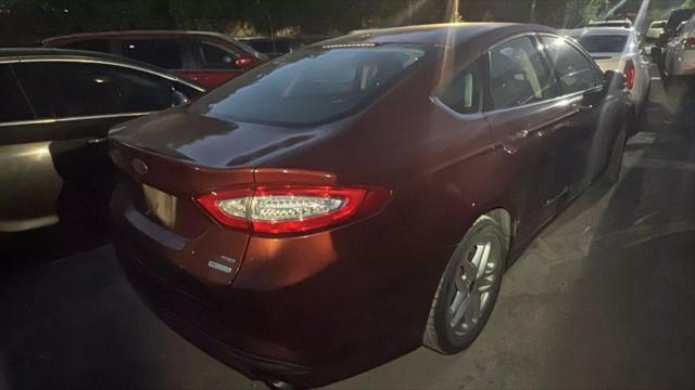 used 2014 Ford Fusion car, priced at $2,950