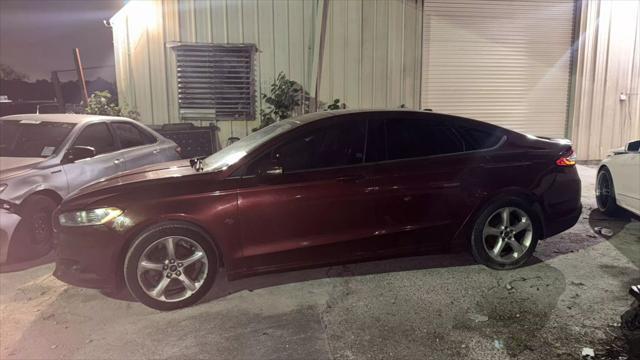 used 2014 Ford Fusion car, priced at $2,950
