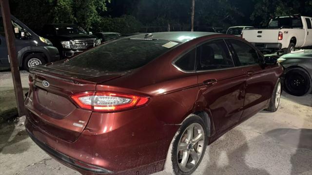 used 2014 Ford Fusion car, priced at $2,950