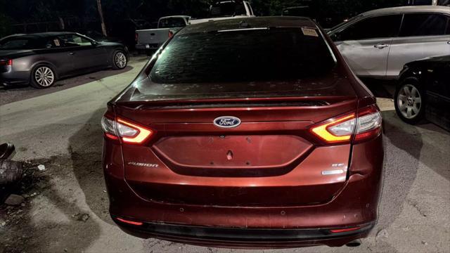 used 2014 Ford Fusion car, priced at $2,950
