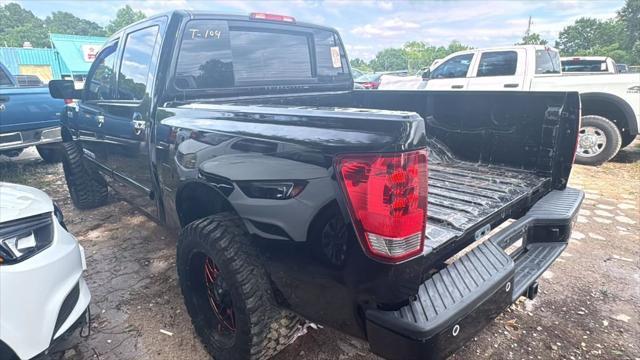 used 2014 Nissan Titan car, priced at $5,500