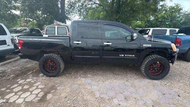 used 2014 Nissan Titan car, priced at $5,500