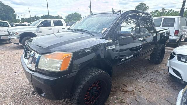 used 2014 Nissan Titan car, priced at $5,500