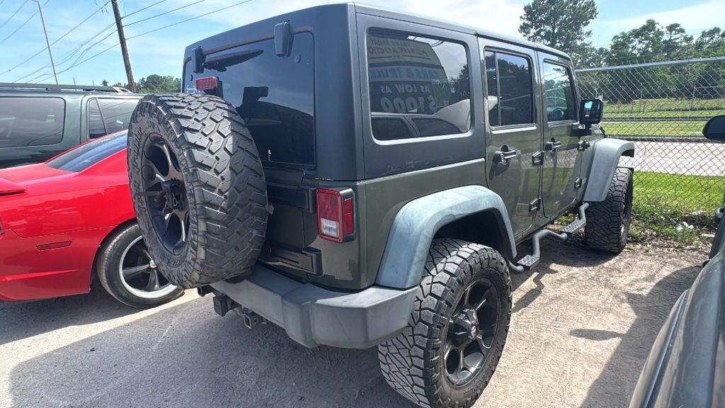 used 2015 Jeep Wrangler Unlimited car, priced at $11,900