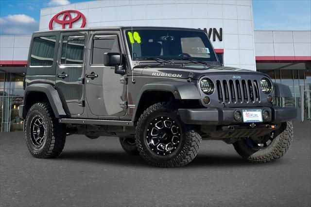 used 2014 Jeep Wrangler Unlimited car, priced at $23,750