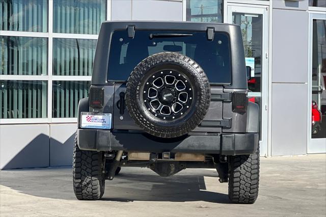 used 2014 Jeep Wrangler Unlimited car, priced at $23,750