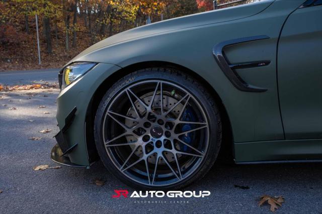 used 2018 BMW M4 car, priced at $57,500