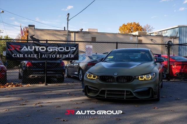 used 2018 BMW M4 car, priced at $57,500