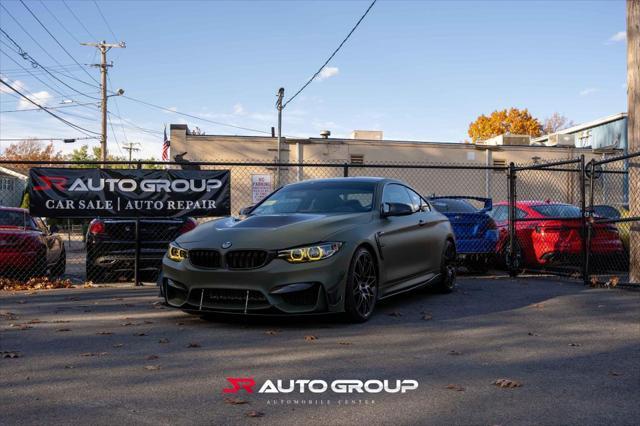 used 2018 BMW M4 car, priced at $57,500