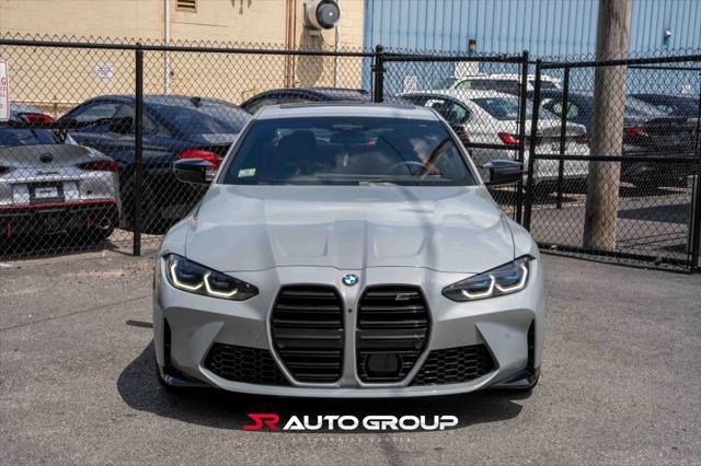 used 2024 BMW M4 car, priced at $77,500