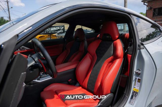 used 2024 BMW M4 car, priced at $77,500