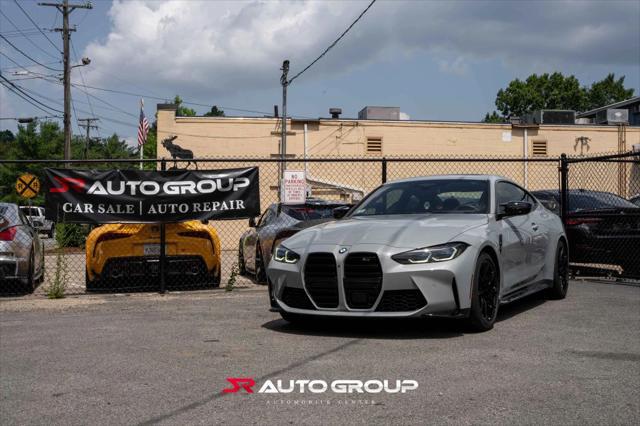 used 2024 BMW M4 car, priced at $77,500