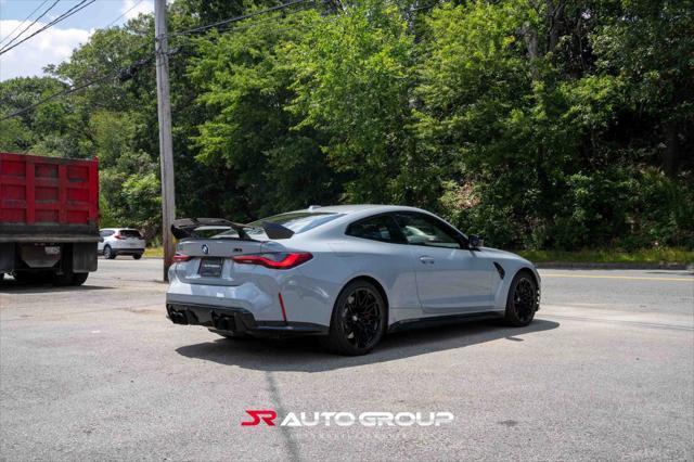 used 2024 BMW M4 car, priced at $77,500