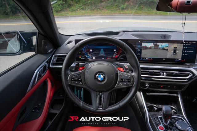 used 2024 BMW M4 car, priced at $77,500