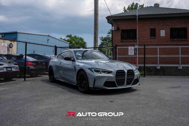 used 2024 BMW M4 car, priced at $77,500