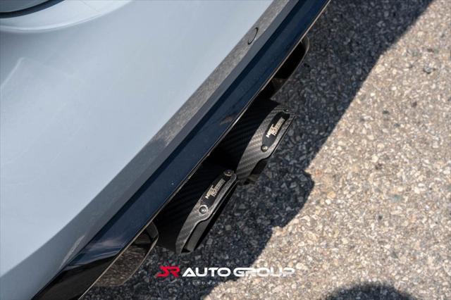 used 2024 BMW M4 car, priced at $77,500