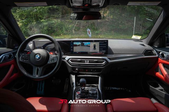 used 2024 BMW M4 car, priced at $77,500