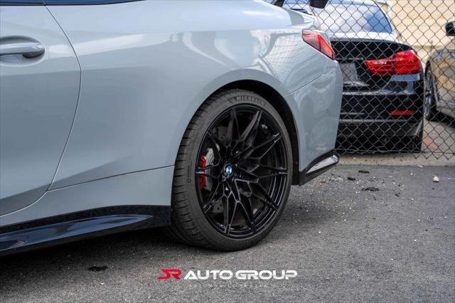 used 2024 BMW M4 car, priced at $77,500