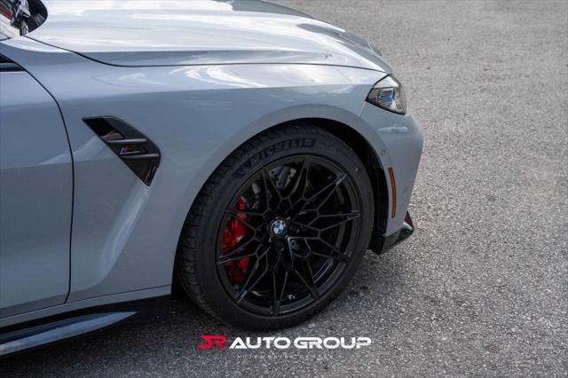used 2024 BMW M4 car, priced at $77,500