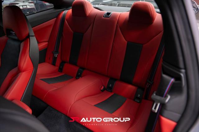 used 2024 BMW M4 car, priced at $77,500