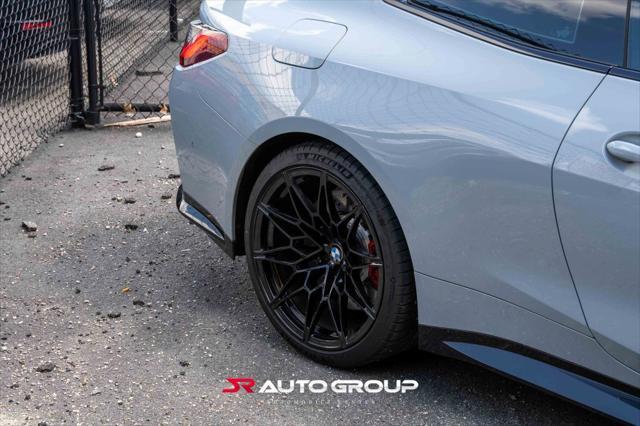 used 2024 BMW M4 car, priced at $77,500
