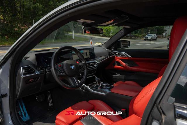 used 2024 BMW M4 car, priced at $77,500
