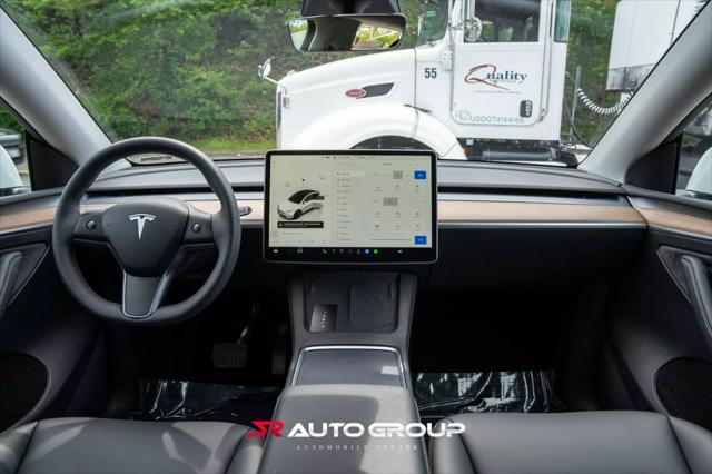 used 2022 Tesla Model Y car, priced at $30,500