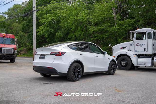 used 2022 Tesla Model Y car, priced at $30,500