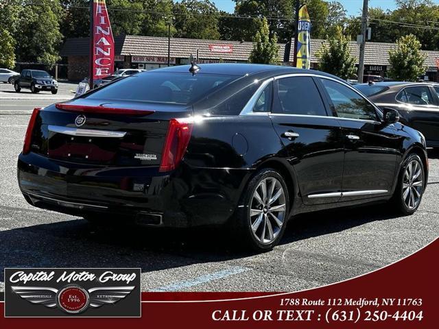 used 2014 Cadillac XTS car, priced at $4,977