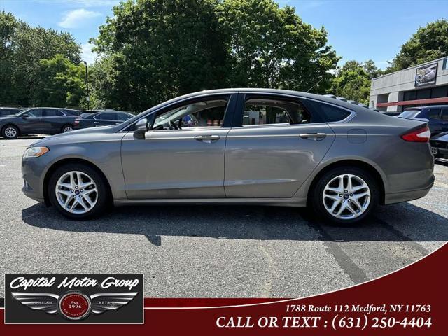 used 2013 Ford Fusion car, priced at $6,977