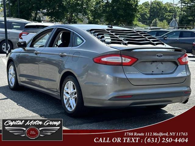 used 2013 Ford Fusion car, priced at $6,977