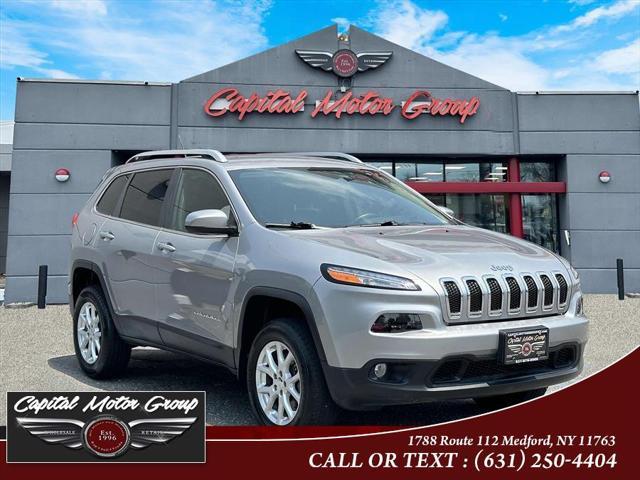 used 2014 Jeep Cherokee car, priced at $10,977