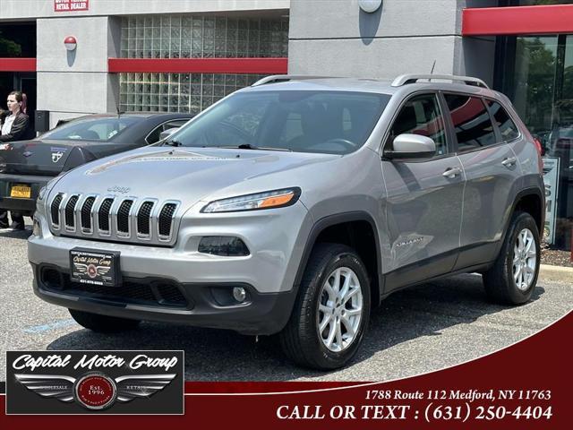 used 2014 Jeep Cherokee car, priced at $10,977