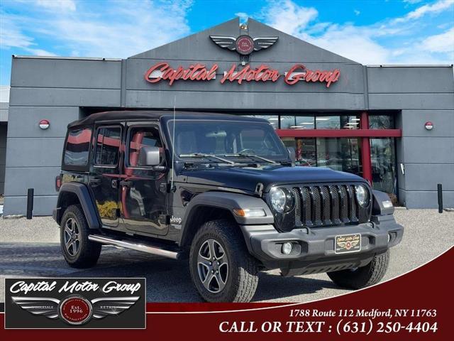 used 2018 Jeep Wrangler Unlimited car, priced at $19,977