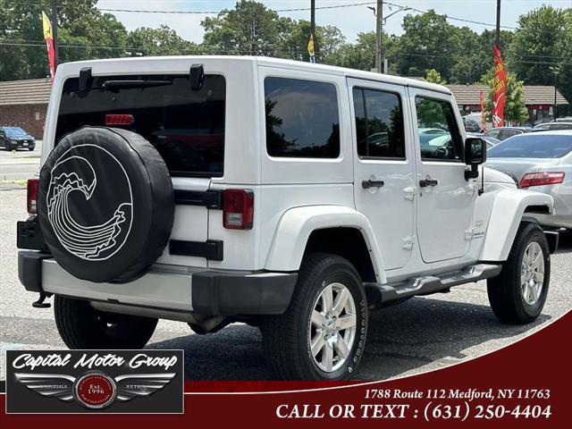 used 2014 Jeep Wrangler Unlimited car, priced at $15,588