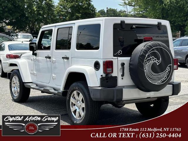 used 2014 Jeep Wrangler Unlimited car, priced at $15,588