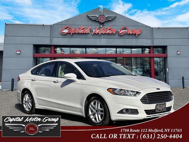 used 2016 Ford Fusion car, priced at $9,977