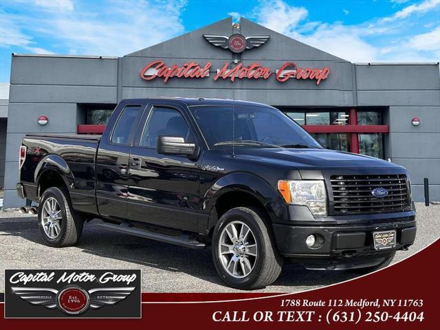 used 2014 Ford F-150 car, priced at $13,977