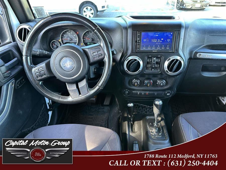 used 2015 Jeep Wrangler Unlimited car, priced at $16,577