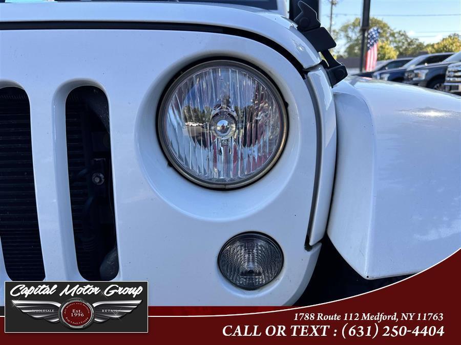 used 2015 Jeep Wrangler Unlimited car, priced at $16,577
