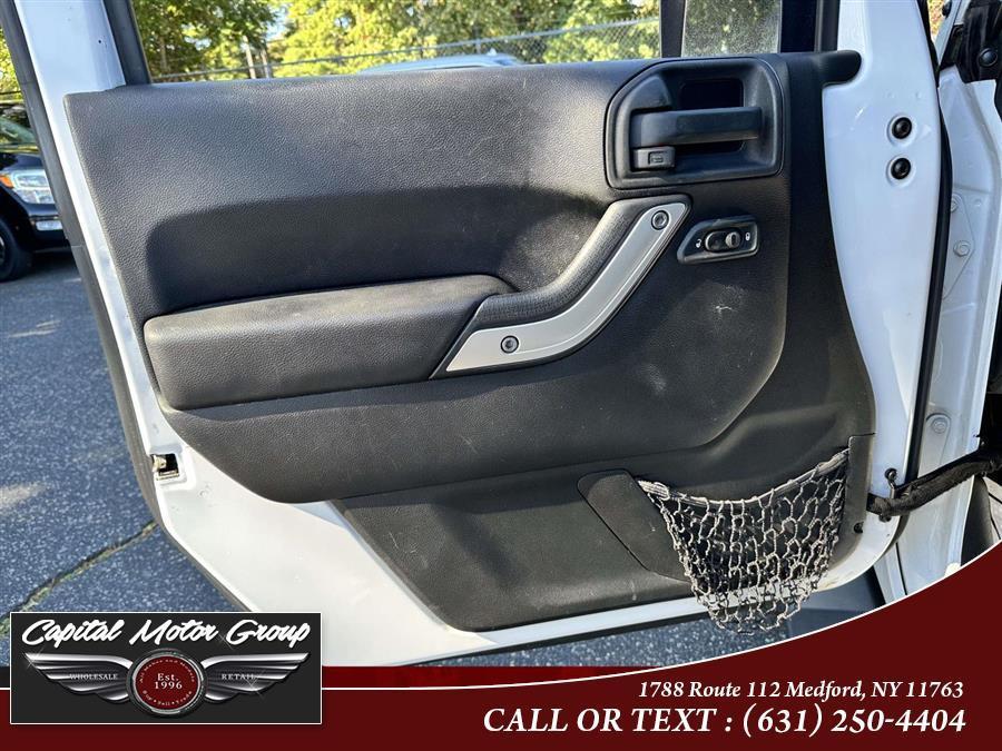 used 2015 Jeep Wrangler Unlimited car, priced at $16,577