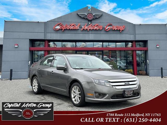 used 2012 Ford Fusion car, priced at $3,977