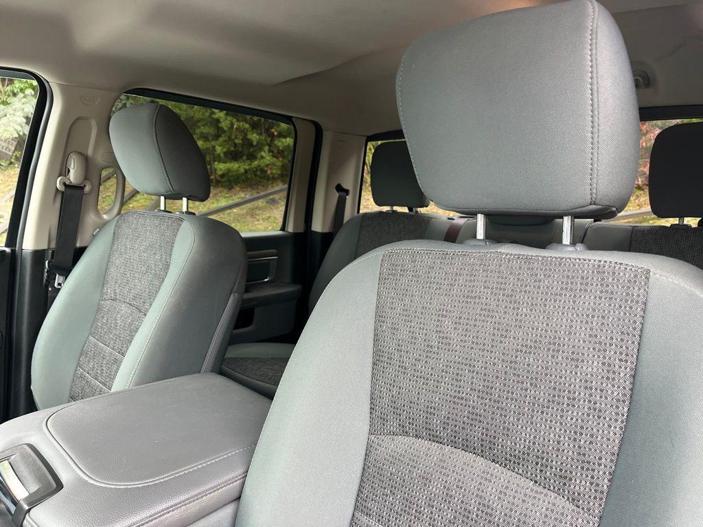 used 2018 Ram 1500 car, priced at $27,648