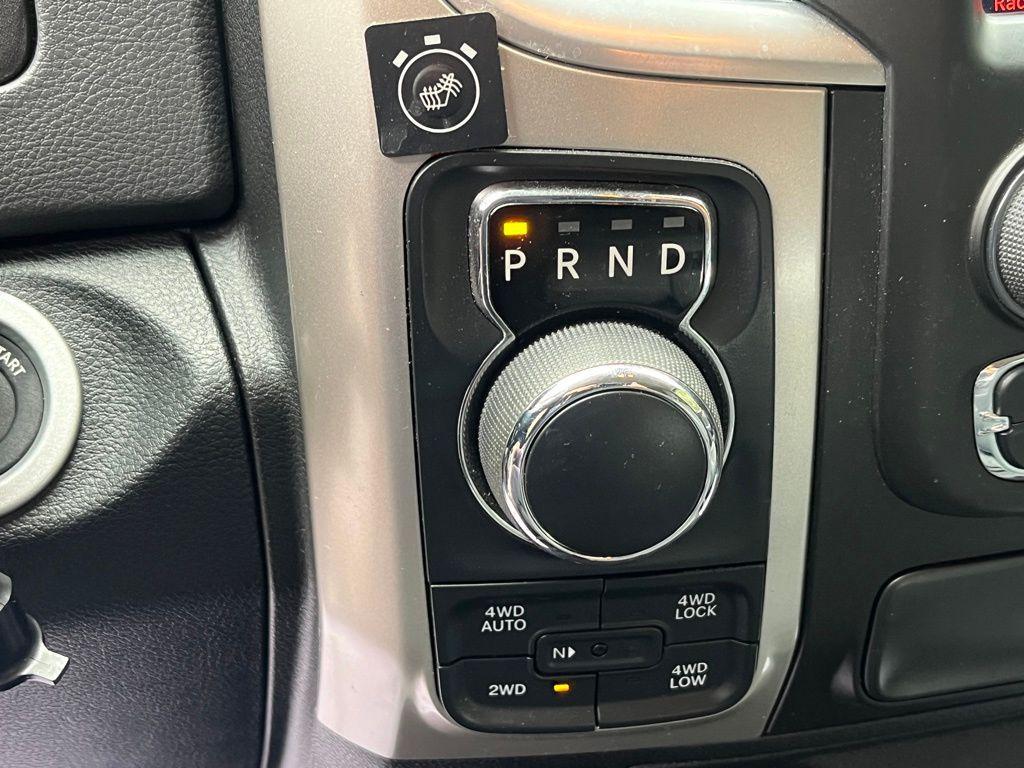 used 2018 Ram 1500 car, priced at $27,648
