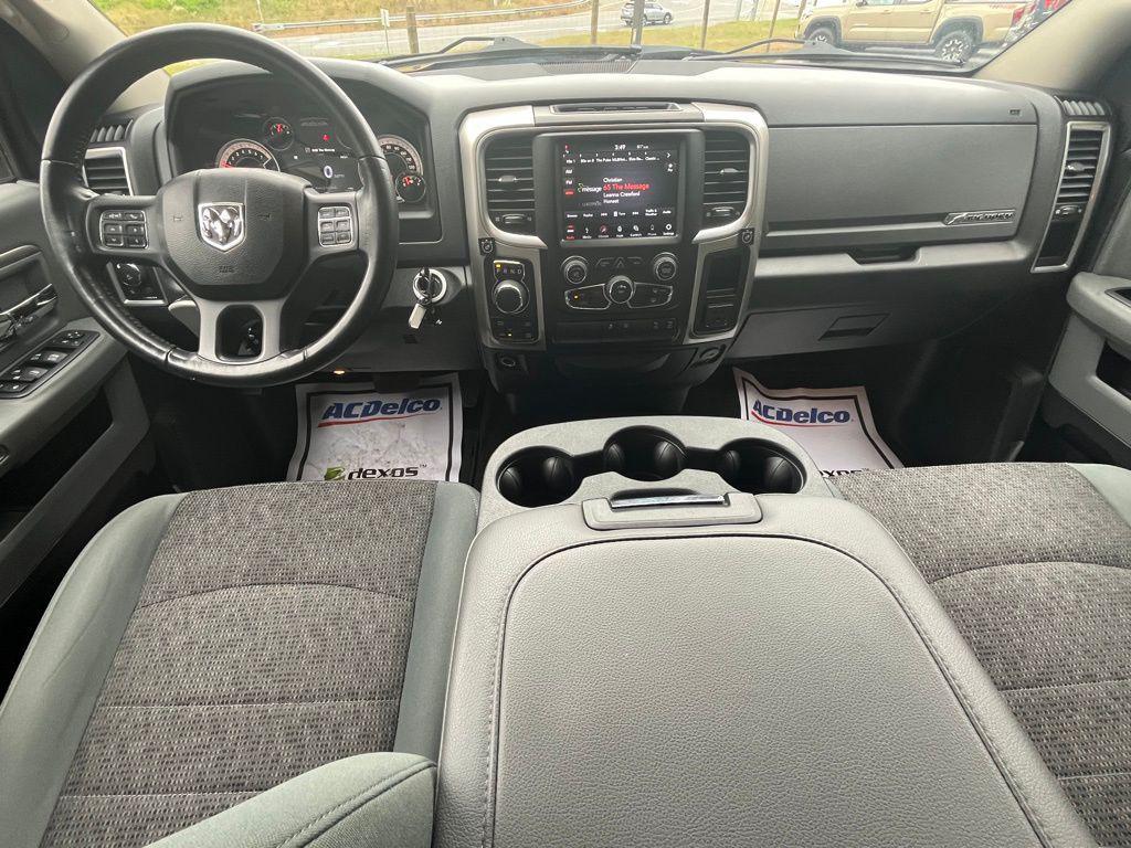 used 2018 Ram 1500 car, priced at $27,648