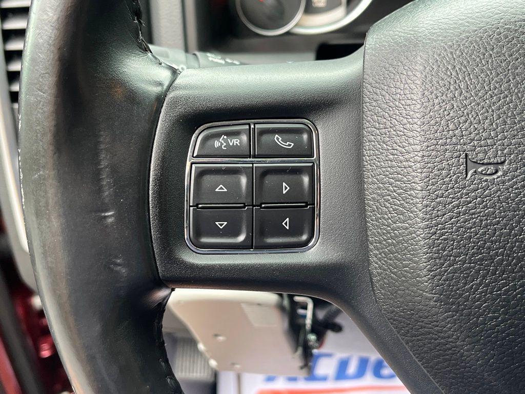used 2018 Ram 1500 car, priced at $27,648