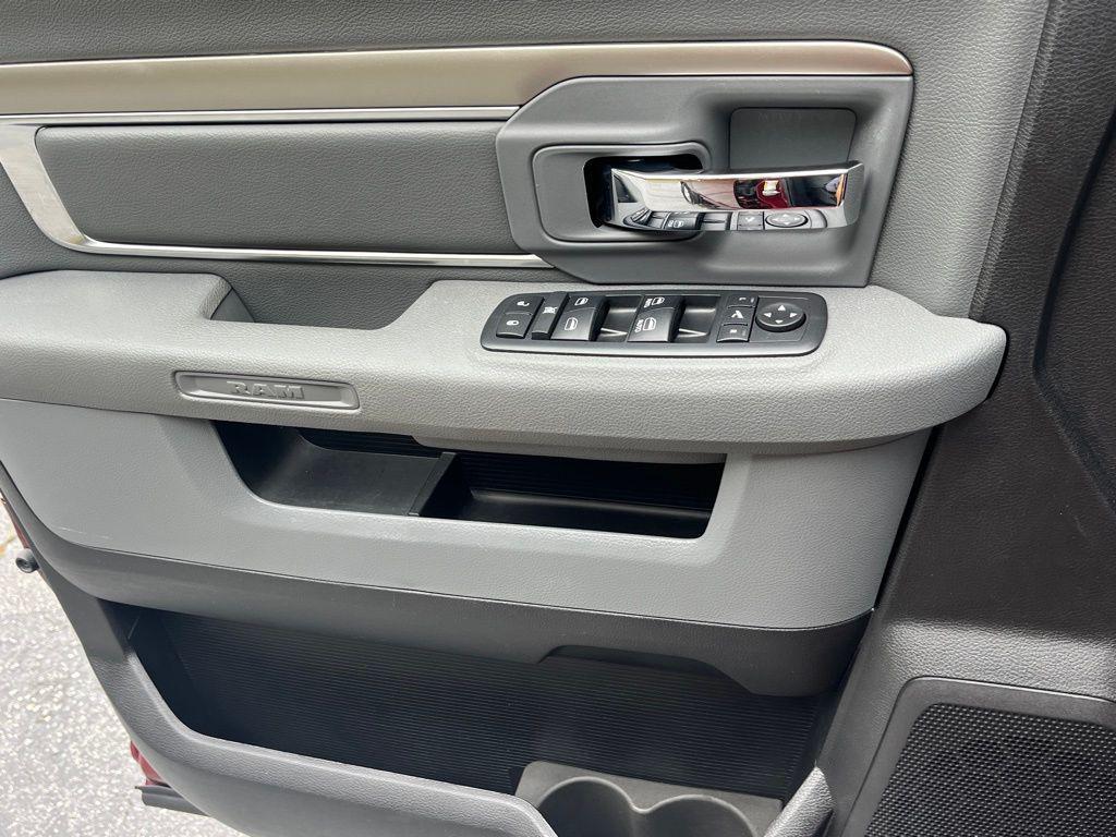 used 2018 Ram 1500 car, priced at $27,648