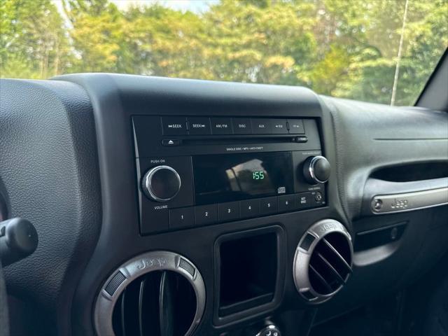 used 2015 Jeep Wrangler Unlimited car, priced at $20,705